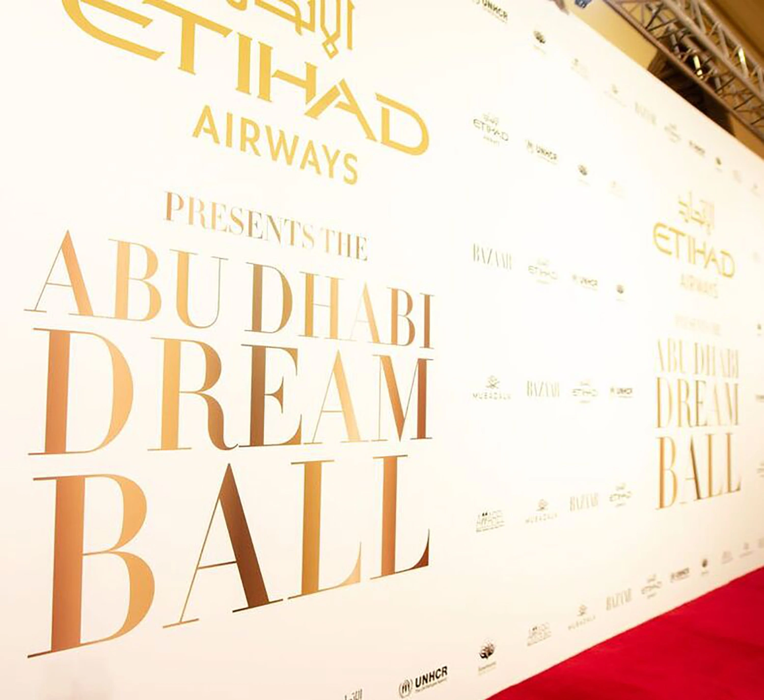 Abu Dhabi Dream Ball branded media wall prepared for red carpet arrivals.