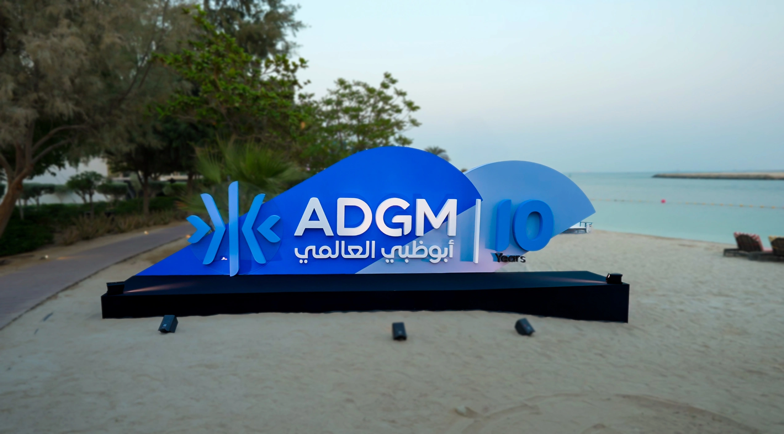 ADGM 10-year anniversary branded landmark installation positioned along the waterfront