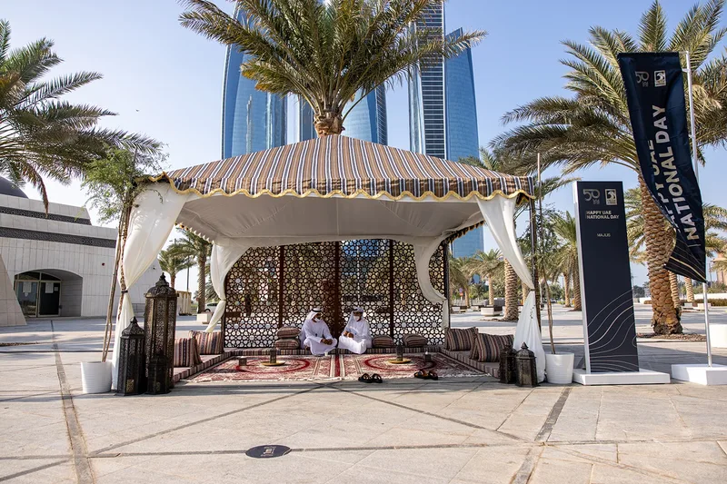 Evolution Events outdoor lounge beneath ADNOC headquarters during the Jubilee and National Day celebration