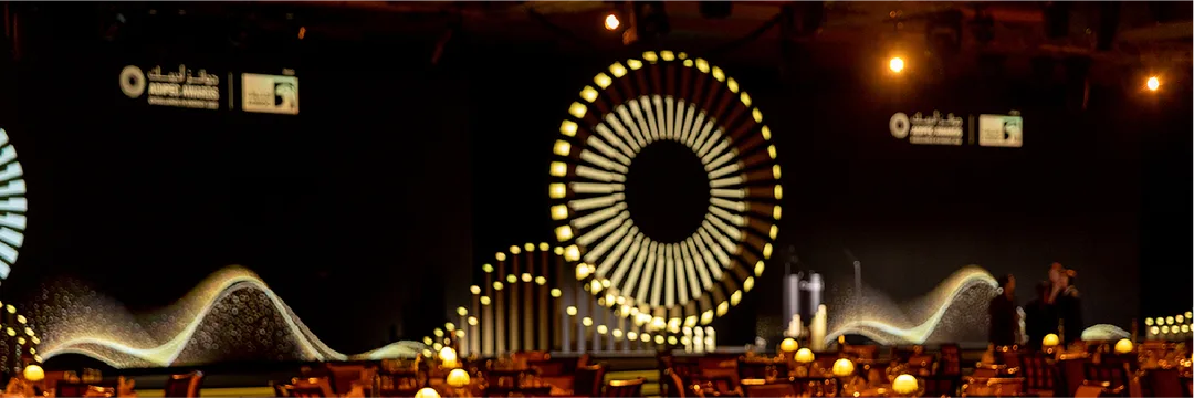 A 42-metre stage, synchronised table lighting and nominee-led pre-function experience created for more than 600 energy-sector guests at Emirates Palace.