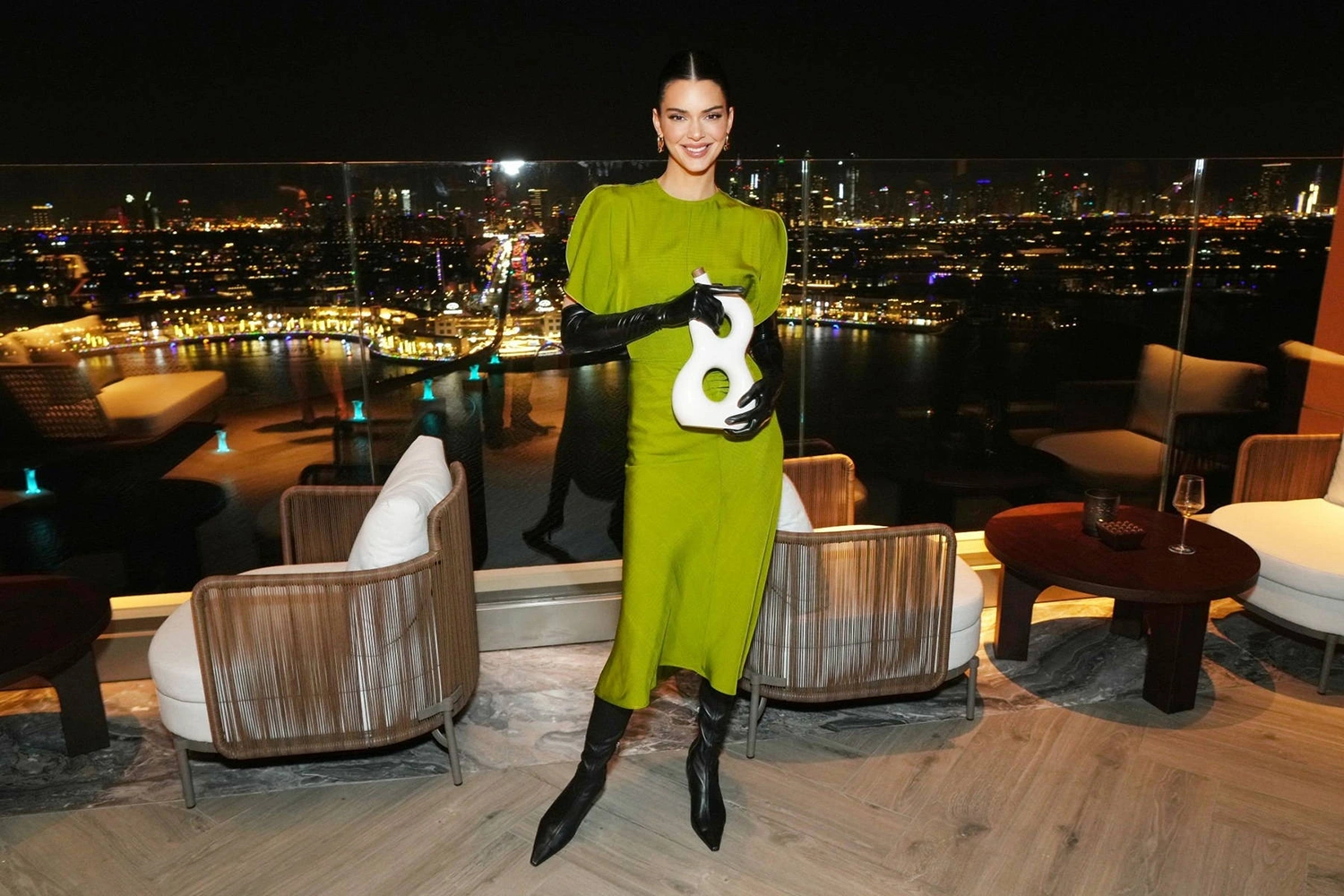 VIP celebrity dinner setup featuring custom mirrored tables and luxury tableware