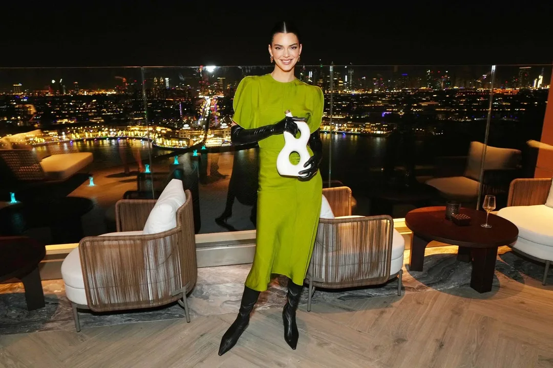 VIP celebrity dinner setup featuring custom mirrored tables and luxury tableware