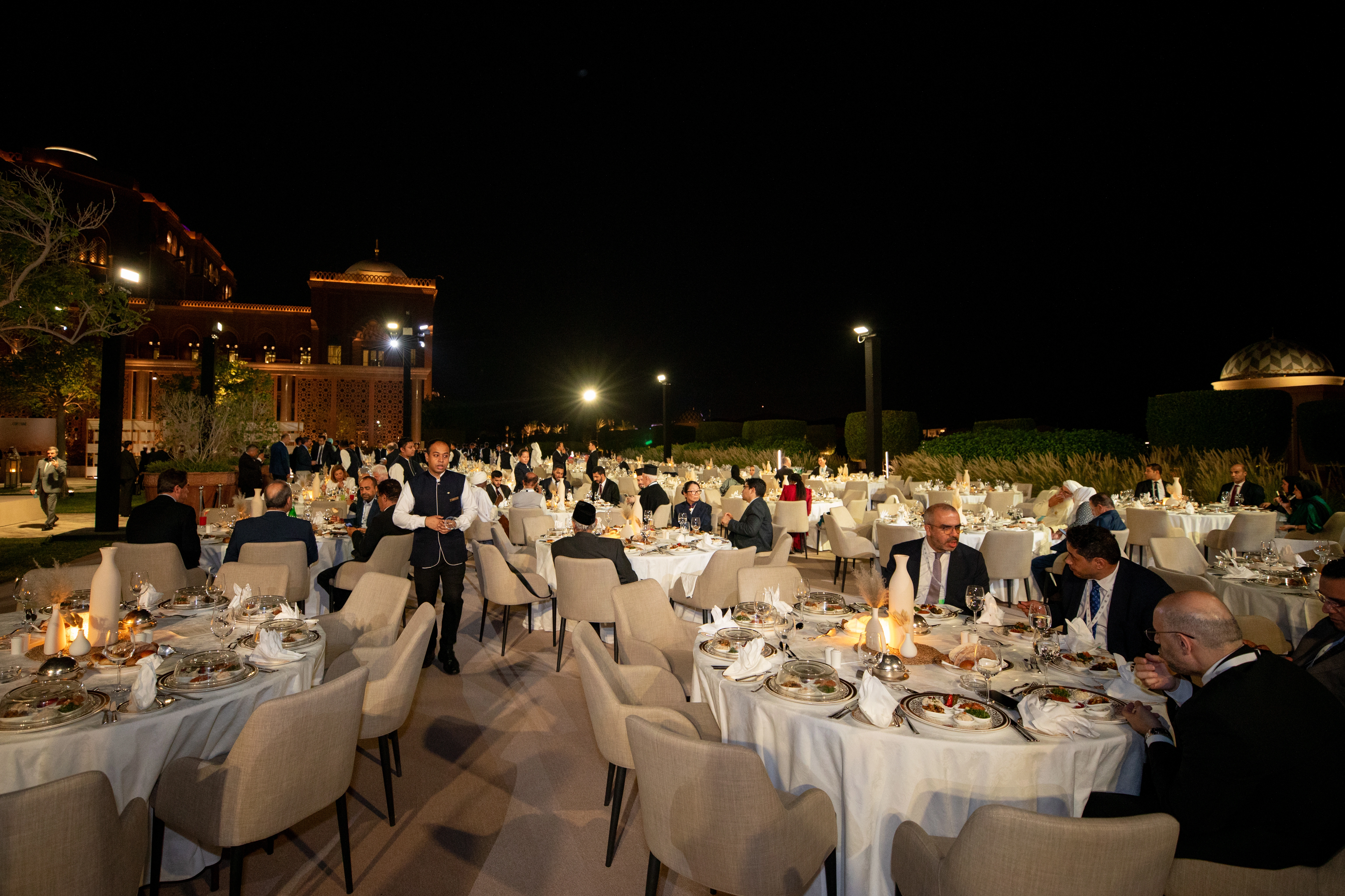 Beautifully styled banquet tables prepared for the Global Faith Leaders Gala Dinner