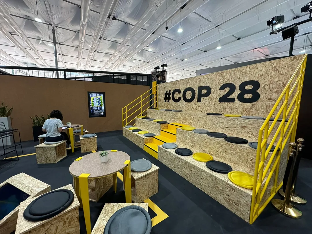 Sustainable corporate exhibition stand constructed with eco-friendly timber framing at COP28 Dubai