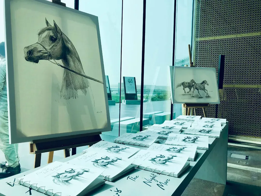 For the Love of Horses exhibition featuring equestrian sketches, framed artwork and illustrated publications
