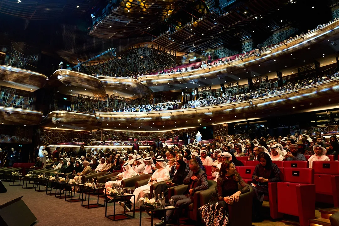 Wide-angle shot of full auditorium audience during HIPA photography awards ceremony