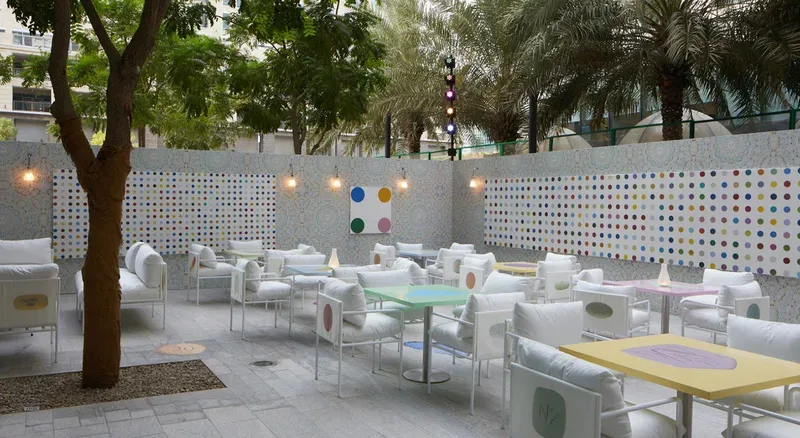 Outdoor lounge and hospitality seating at Prada Mode Dubai